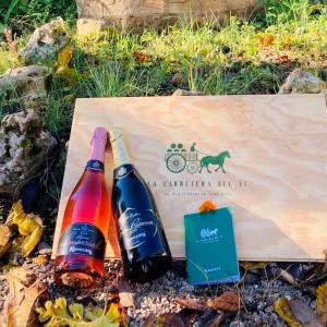 Imperial Rosé and Gran Reserve Brut Nature Cava with La Carretera del Vi passport and wine box